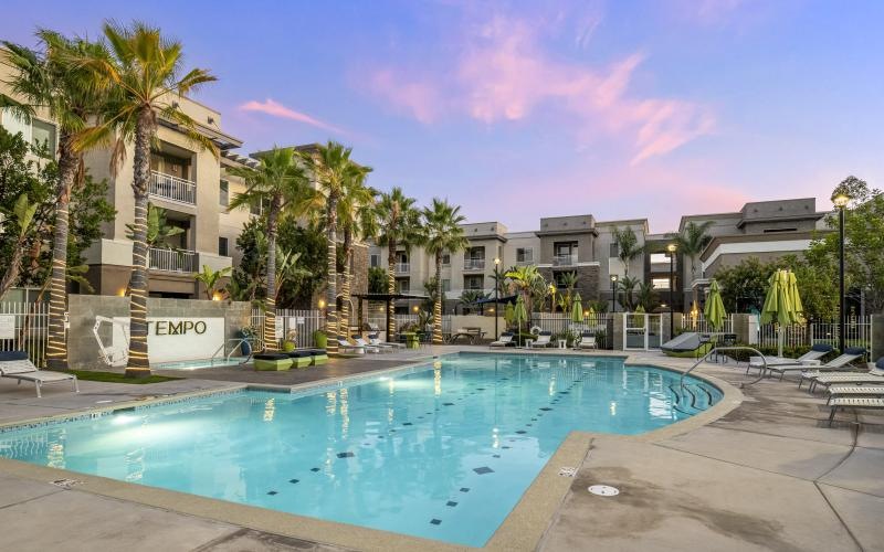 a pool in front of a building