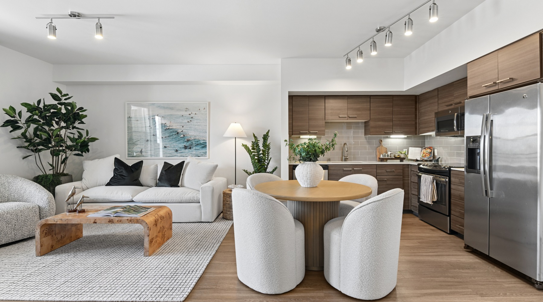 Living room, dining table, and kitchen layout