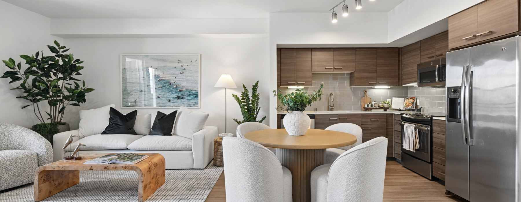 Living room, dining table, and kitchen layout