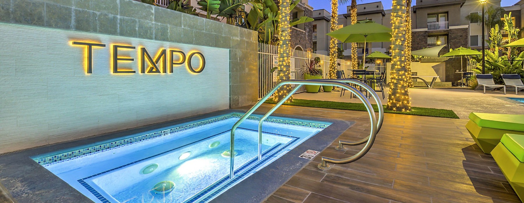 a pool with a building in the background