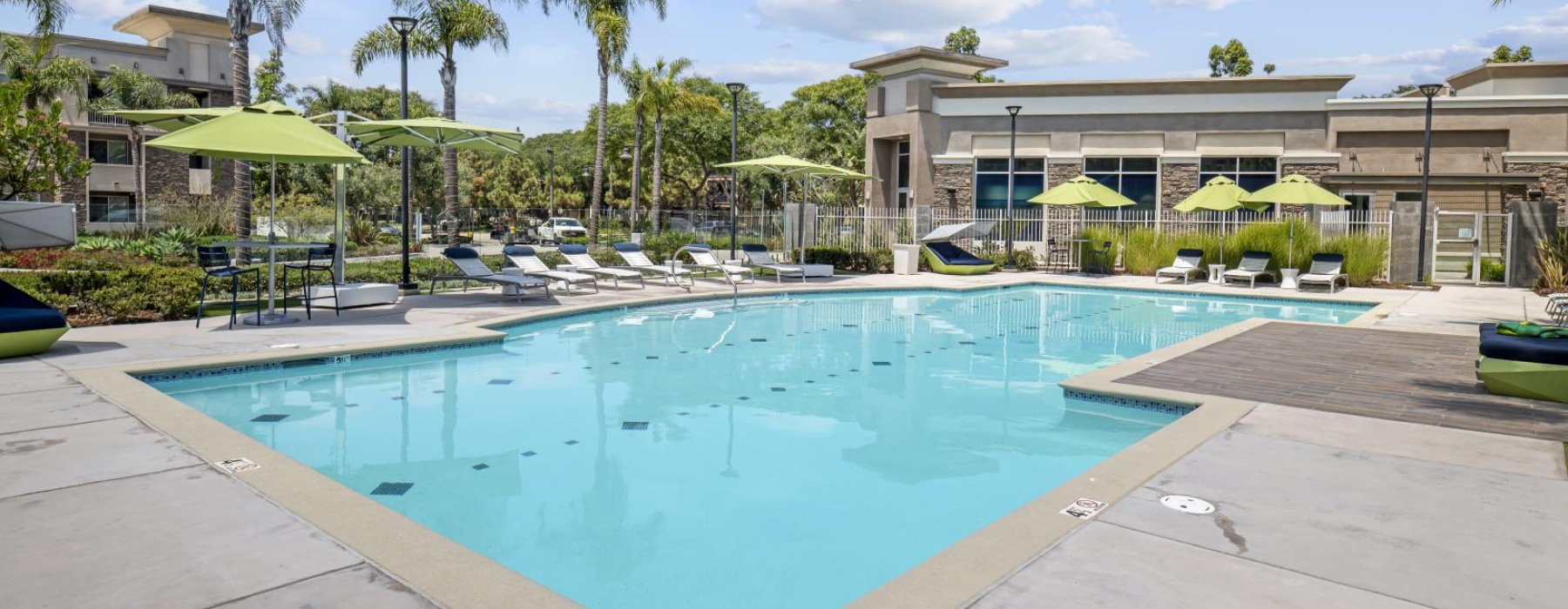 a swimming pool with umbrellas